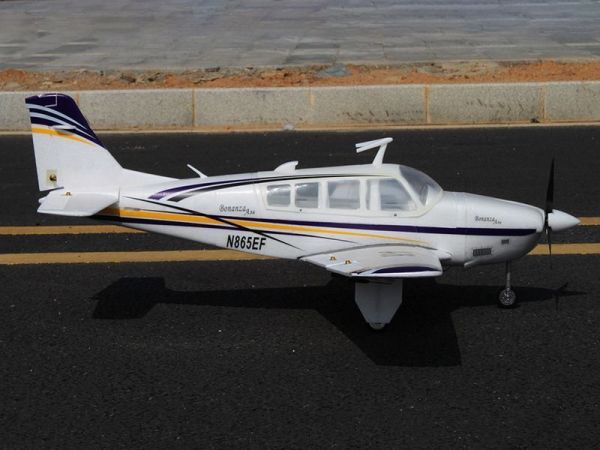 Радиоуправляемый самолет Top RC ST Beechcraft Bonanza A36 фиолетовый 1280мм (шасси) PNP